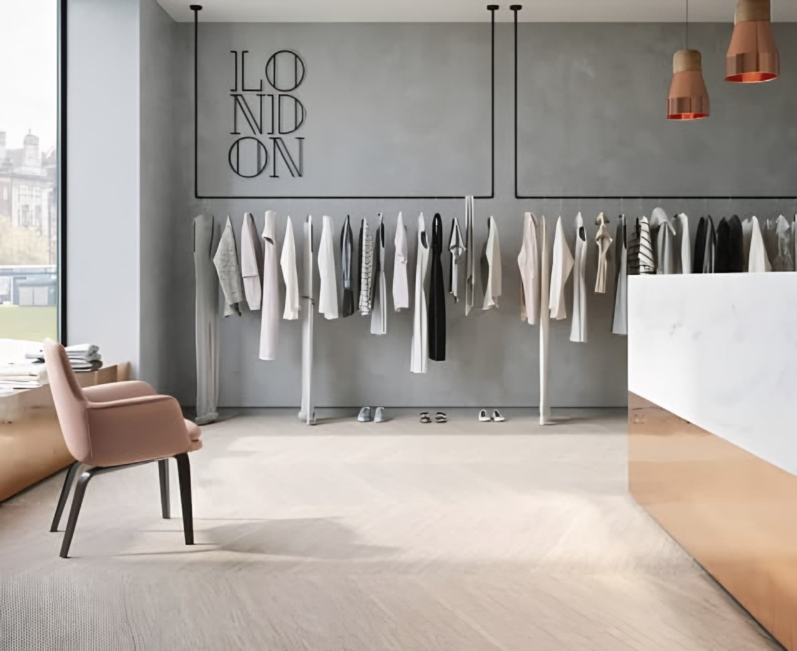 Clothing boutique with a pale wood-effect floor