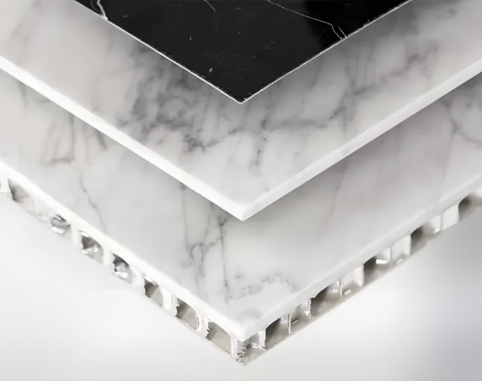 Edge of a marble veneer panel showing its lightweight honeycomb core